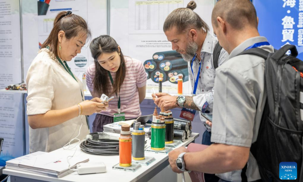 Visitors communicate with Chinese exhibitors at the China Brand Fair in Budapest, Hungary, June 26, 2025. The China Brand Fair 2025 kicked off here on Thursday, bringing together over 270 companies from 17 Chinese provinces and municipalities.

Since its inception in 2015, the China Brand Fair has been held seven times in Hungary. The 2025 edition features 10,000 square meters of exhibition space and products spanning electronics, machinery, building materials, fitness equipment, textiles, daily goods, and food items. (Photo by Sandor Bankuti/Xinhua)