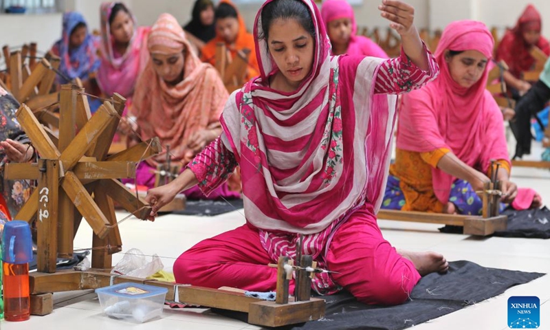 Weavers work at a muslin workshop in Dhaka, Bangladesh, on May 24, 2025. Bangladesh is undertaking a national effort to revive its legendary Dhaka muslin fabric, once hailed as woven air for its ethereal lightness and intricate craftsmanship during the Mughal era. (Photo: Xinhua)