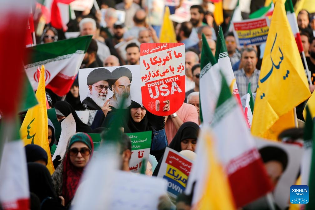 People celebrate the ceasefire between Iran and Israeal at Enghelab Square in Tehran, Iran, on June 24, 2025. The ceasefire was declared on Tuesday. (Photo: Xinhua)