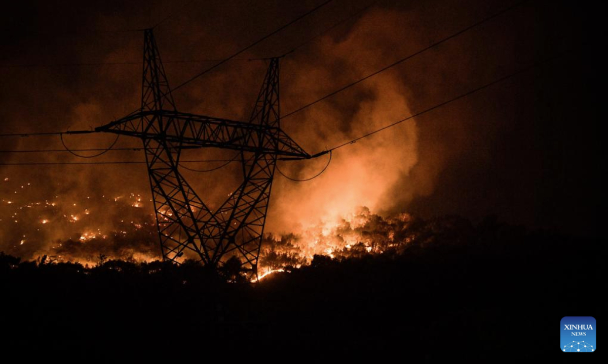 This photo taken on June 26, 2025 shows a forest fire that broke out on Wednesday afternoon in Türkiye's western province of Izmir, with firefighting efforts continuing on Thursday. (Mustafa Kaya/Handout via Xinhua)