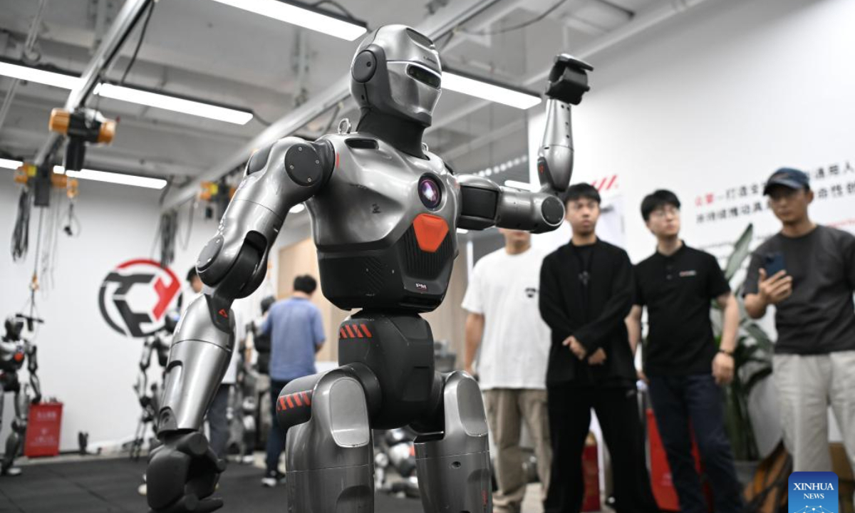 A humanoid robot waving arm is pictured at a robot company in Shenzhen, south China's Guangdong Province, June 25, 2025. In recent years, Guangdong Province has taken various measures to develop the robot industry. The application and promotion of embodied artificial intelligence robots has been gaining speed in Guangzhou and Shenzhen, and a provincial embodied artificial intelligence robot innovation center was established in Shenzhen. In addition, cities like Foshan, Dongguan and Zhuhai are encouraged to give full play to their manufacturing advantages to build robot production bases.

Guangdong's industrial robot output exceeded 240,000 units in 2024 with a year-on-year increase of 31.2 percent, ranking first in the country for five consecutive years, according to the Department of Industry and Information Technology of Guangdong Province. (Xinhua/Deng Hua)