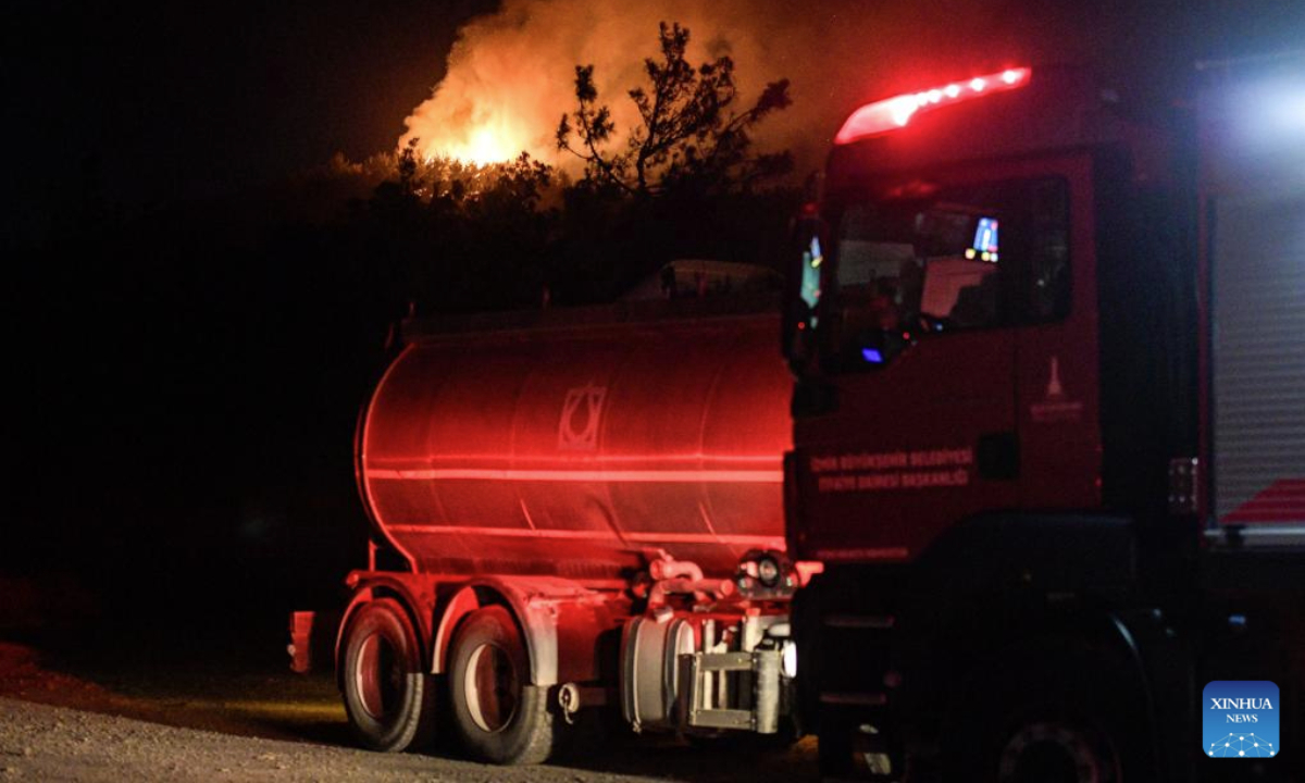 This photo taken on June 26, 2025 shows a forest fire that broke out on Wednesday afternoon in Türkiye's western province of Izmir, with firefighting efforts continuing on Thursday. (Mustafa Kaya/Handout via Xinhua)