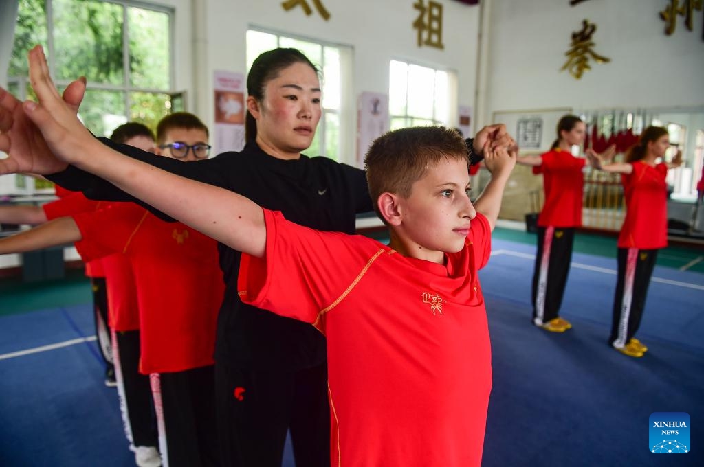 A coach instructs a Russian student to practice Bajiquan, a powerful style of Kung Fu, at a training base in Qingxian County, Cangzhou City, north China's Hebei Province, June 25, 2025. A Bajiquan training base in Qingxian County welcomed this year's first batch of international students from Russia, who will learn the traditional Bajiquan and experience the Chinese martial arts culture. (Photo: Xinhua)