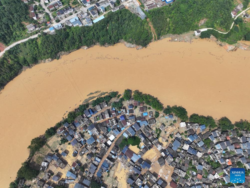 An aerial drone photo shows a section of Duliu River in Meilin Township of Sanjiang Dong Autonomous County, south China's Guangxi Zhuang Autonomous Region, June 25, 2025. The local authorities beef up flood control and rescue efforts as days of torrential rains triggered flooding in several places in Guangxi. (Photo: Xinhua)