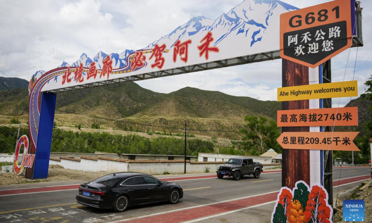 A car runs on the Altay-Hemu highway in northwest China's Xinjiang Uygur Autonomous Region, June 30, 2025. The 209.45-kilometer-long highway linking Altay City and Hemu Village opened officially on Monday, connecting a number of tourist destinations. (Xinhua/Xu Hongyan)