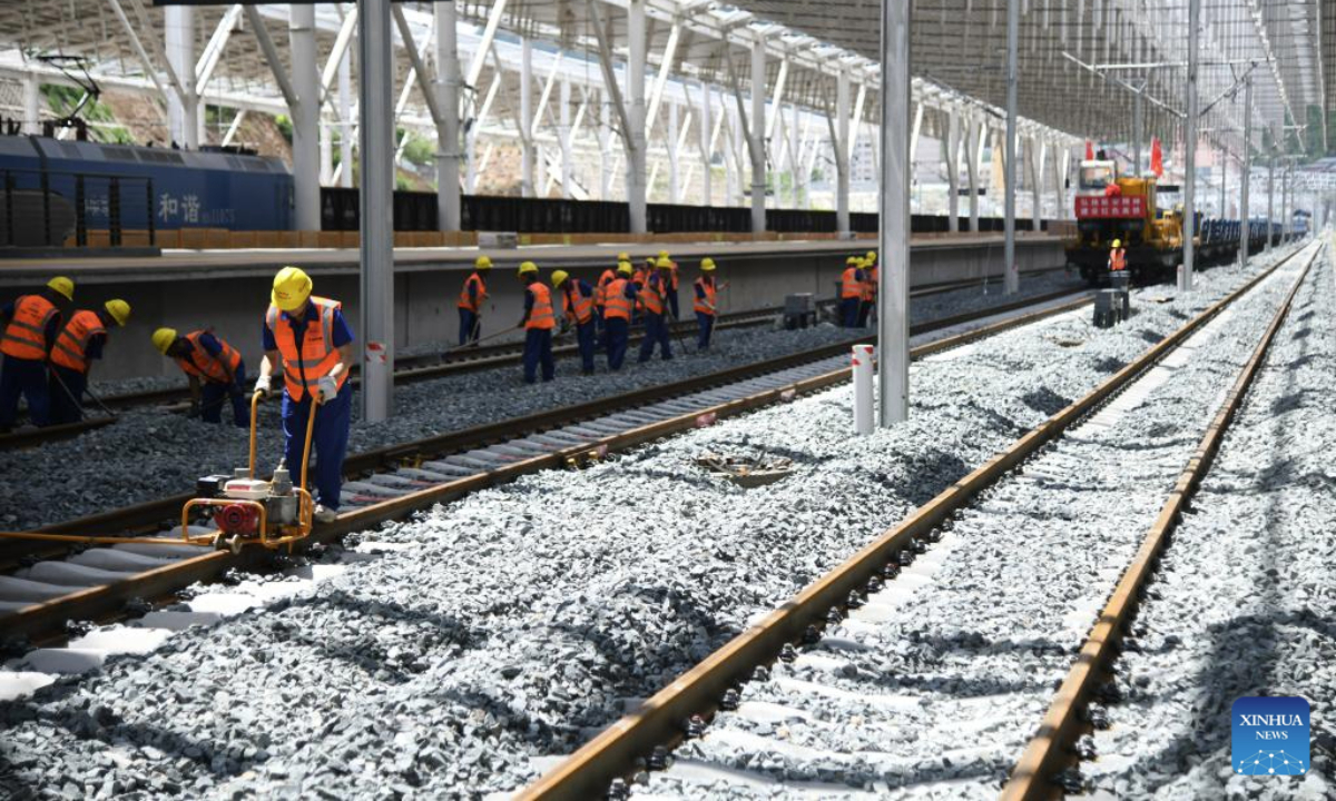 Workers carry out construction work at Yan'an Railway Station in Yan'an, northwest China's Shaanxi Province, July 1, 2025. Track-laying for a high-speed railway linking Xi'an and Yan'an in Shaanxi completed on Tuesday.

Once launched, the new railway will shorten the trip between Xi'an and Yan'an from 2.5 hours to around one hour. (Xinhua/Zhang Bowen)