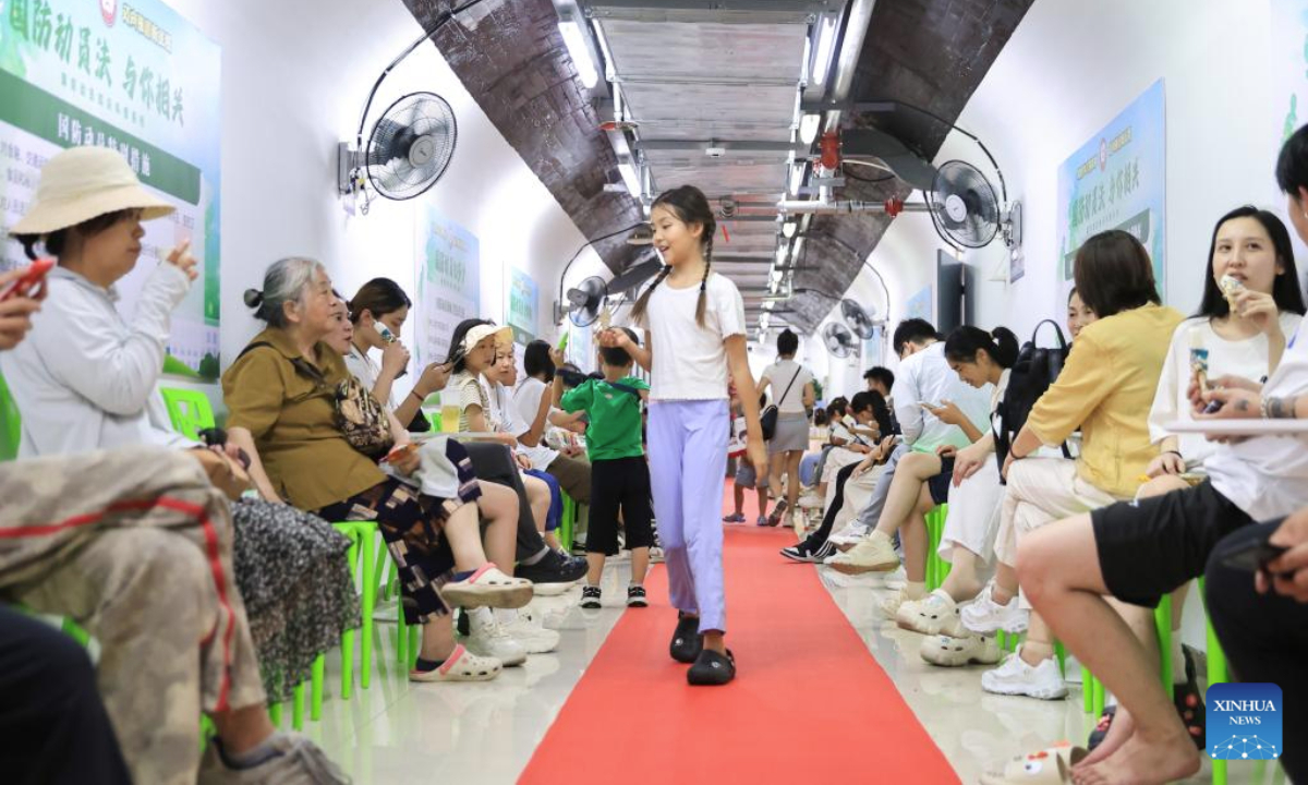 Residents enjoy leisure time within an air-raid shelter in Nanjing, east China's Jiangsu Province, July 2, 2025. Due to hot weather this summer, Nanjing has opened 22 air-raid shelters for free, providing local residents with various social and leisure services. (Photo by Su Yang/Xinhua)