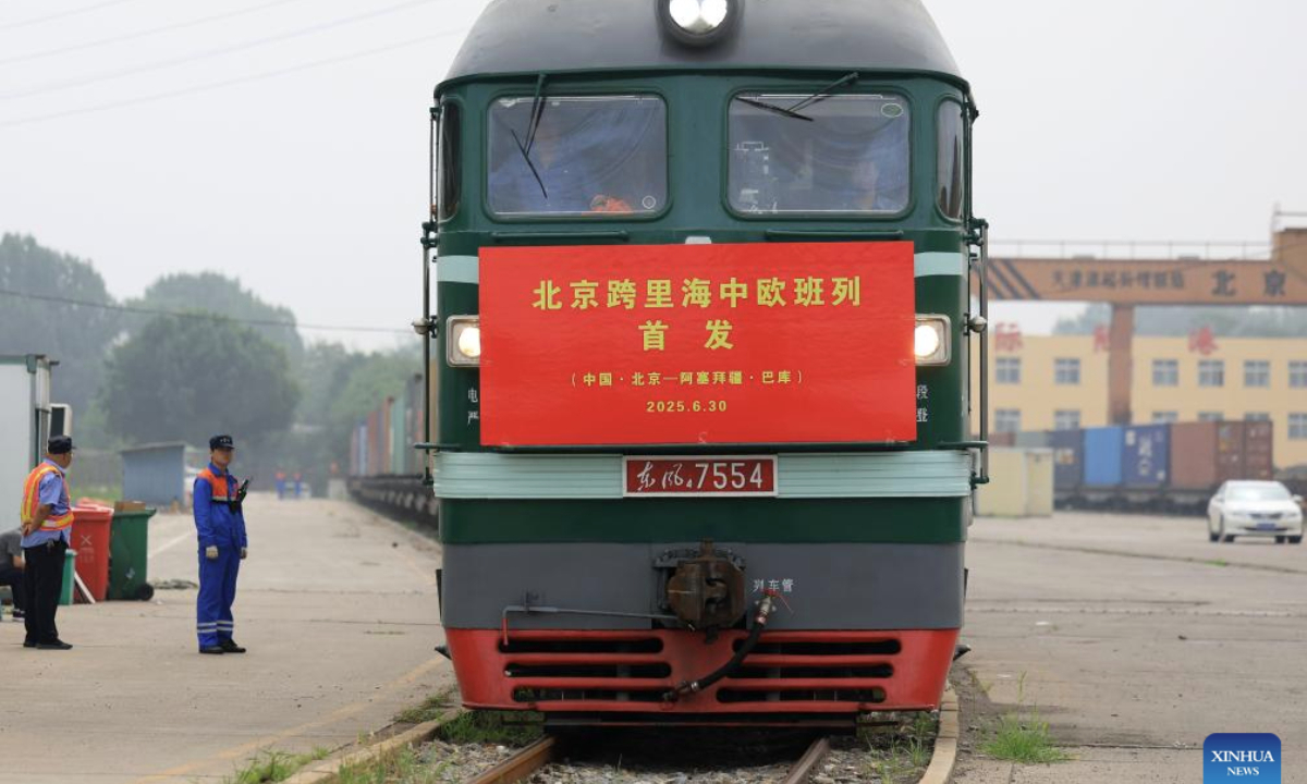 A China-Europe freight train waits for departure at Beijing International Land Port in Fangshan District of Beijing, capital of China, June 30, 2025.
A new China-Europe freight train route linking Beijing to Baku of Azerbaijan was launched Monday. Riding on the rail-sea-rail multimodal transport, the payload is scheduled to get across the Caspian Sea by ship, and arrive in Baku in 15 days. (Xinhua/Zhang Chenlin)