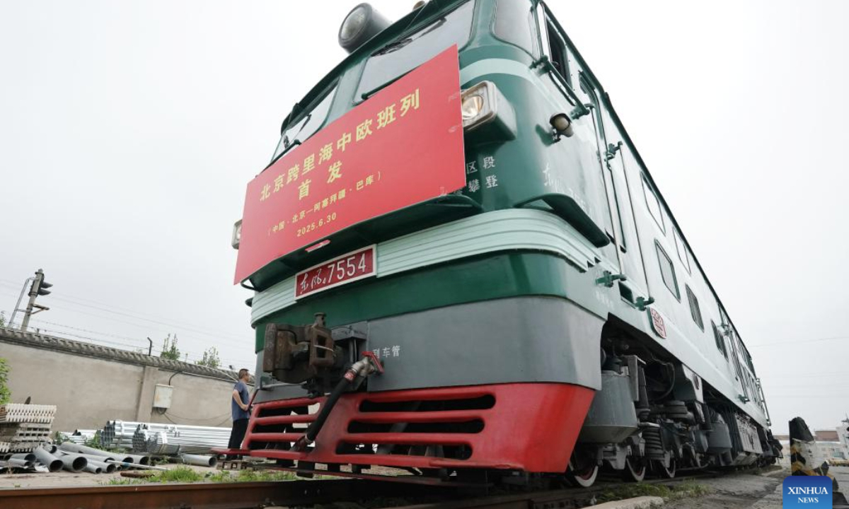 A China-Europe freight train departs from Beijing International Land Port in Fangshan District of Beijing, capital of China, June 30, 2025.
A new China-Europe freight train route linking Beijing to Baku of Azerbaijan was launched Monday. Riding on the rail-sea-rail multimodal transport, the payload is scheduled to get across the Caspian Sea by ship, and arrive in Baku in 15 days. (Xinhua/Zhang Chenlin)
