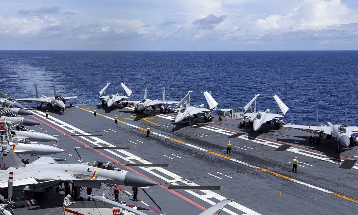 Photo released on June 30, 2025 shows the deployment of carrier-based aircraft on the deck of the Shandong aircraft carrier. The Liaoning and Shandong aircraft carrier formations of the PLA Navy recently wrapped up far seas combat training in the Western Pacific, the PLA Navy announced on June 30. Photo: Xinhua