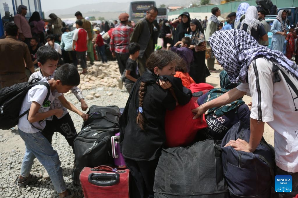 Newly arrived Afghan refugees settle in a temporary camp in Kabul, Afghanistan, June 29, 2025. The United Nations High Commissioner for Refugees (UNHCR) on Saturday raised the alarm over a surge in the number of Afghans returning from Iran under harsh conditions, cautioning that large-scale returns could exacerbate Afghanistan's already fragile situation. (Photo: Xinhua)