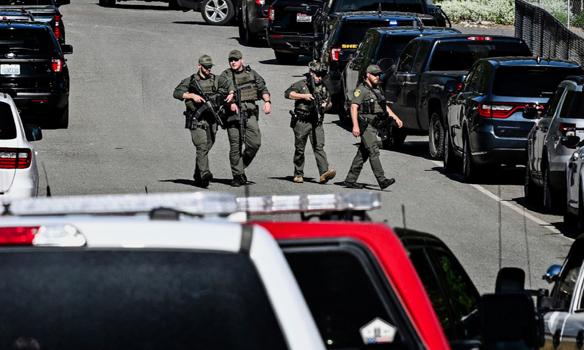 Police officers respond to a shooting in Coeur d'Alene, Idaho, on June 29, 2025. Two firefighters were killed after a man intentionally started a fire and began shooting at first responders, according to local media. Photo: VCG