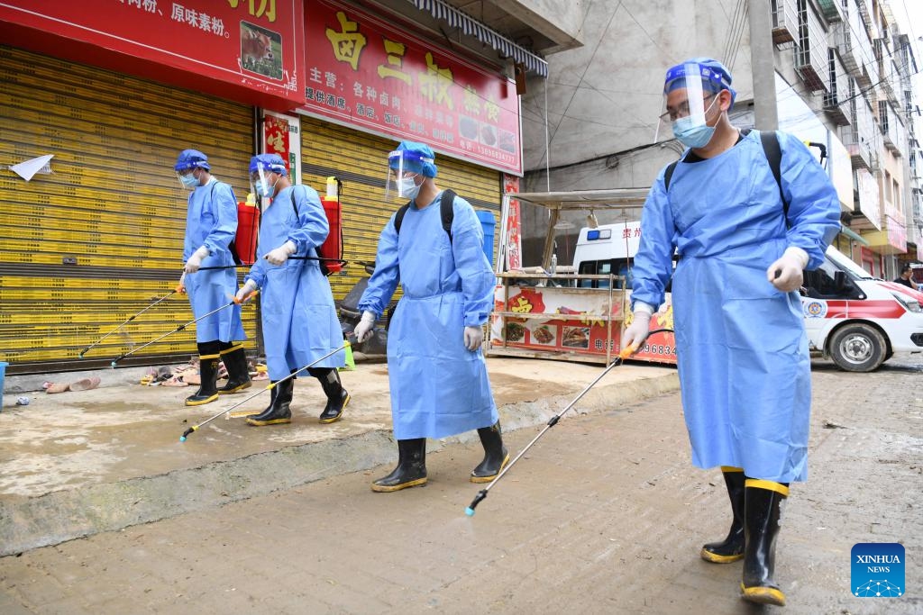 Staff of disease control and prevention department conduct disinfection operations in the flood-stricken Rongjiang County, southwest China's Guizhou Province, June 29, 2025. Heavy flooding has returned to Rongjiang County in southwest China's Guizhou Province, prompting local authorities to re-activate the highest-level emergency flood response, effective from 12:30 p.m. Saturday. (Photo: Xinhua)