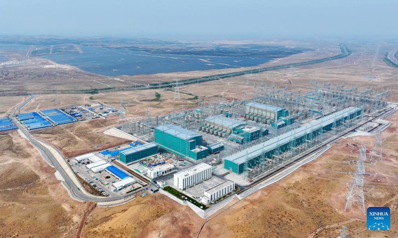 An aerial drone photo shows a view of the Zhongning converter station, the sending end of the Ningxia-Hunan ±800 kV ultra-high voltage direct current transmission project in Zhongwei, northwest China's Ningxia Hui Autonomous Region, June 29, 2025. After a 168-hour trial, the ±800 kV ultra-high voltage direct current transmission project, which brings electricity from northwest China's Ningxia Hui Autonomous Region to central China's Hunan Province, kicked off its official operation at the capability of 4-million-kilowatt on Sunday. (Photo: Xinhua)