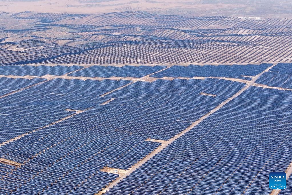 An aerial drone photo shows a photovoltaic farm as part of the Ningxia-Hunan ±800 kV ultra-high voltage direct current transmission project in Zhongwei, northwest China's Ningxia Hui Autonomous Region, June 29, 2025. After a 168-hour trial, the ±800 kV ultra-high voltage direct current transmission project, which brings electricity from northwest China's Ningxia Hui Autonomous Region to central China's Hunan Province, kicked off its official operation at the capability of 4-million-kilowatt on Sunday. (Photo: Xinhua)