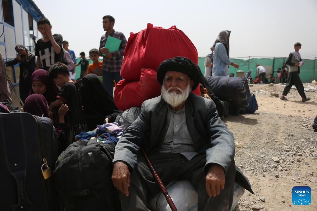 Newly arrived Afghan refugees settle in a temporary camp in Kabul, Afghanistan, June 29, 2025. The United Nations High Commissioner for Refugees (UNHCR) on Saturday raised the alarm over a surge in the number of Afghans returning from Iran under harsh conditions, cautioning that large-scale returns could exacerbate Afghanistan's already fragile situation. (Photo: Xinhua)