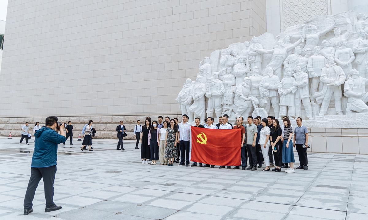 People visit the Museum of the Communist Party of China in Beijing on July 1, 2025, to explore the themed exhibition Staying True to Our Original Aspiration and Founding Mission, which reflects on the Party's remarkable century-long journey. (Photo: Li Hao/GT)