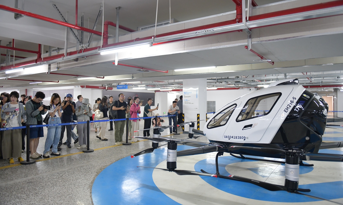 Hefei Heyi Aviation's EH216-S unmanned passenger electric vertical takeoff and landing (eVTOL) aircraft draws attention at the air traffic operation center in Hefei, East China's Anhui Province, on July 2, 2025.Photo: VCG