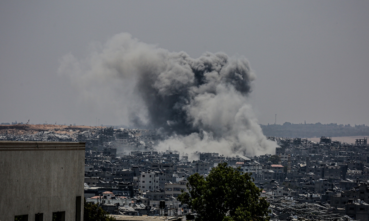 Thick plumes of smoke are seen rising following the Israeli army carried out an airstrike targeting the al-Shujaiya neighborhood in eastern Gaza City on July 2, 2025. Photo: VCG