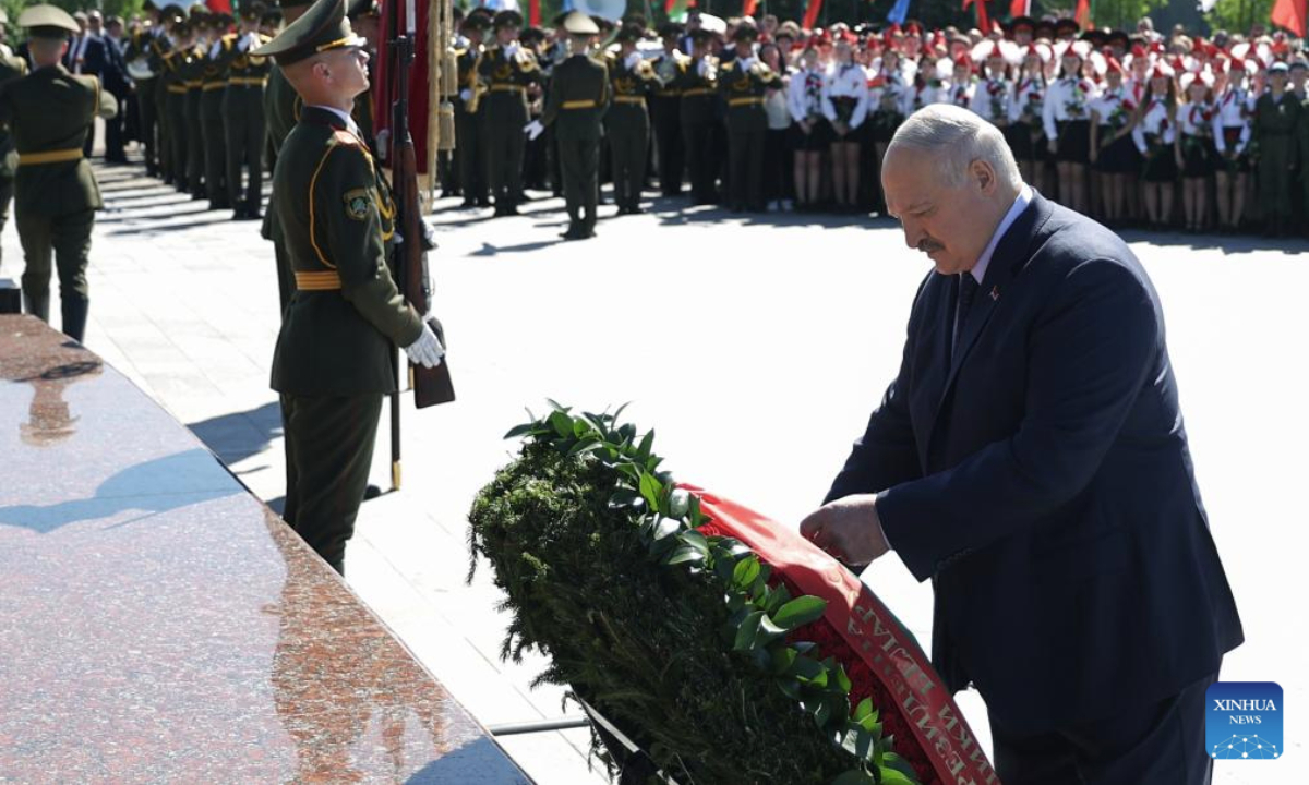 Belarusian President Alexander Lukashenko (front) lays a wreath during an event marking Belarus Independence Day at the Mound of Glory memorial complex outside Minsk, Belarus, on July 3, 2025. Belarus celebrated its most important national holiday on Thursday, commemorating a significant historical moment of liberation during World War II. (Press Service of the President of the Republic of Belarus/Handout via Xinhua)