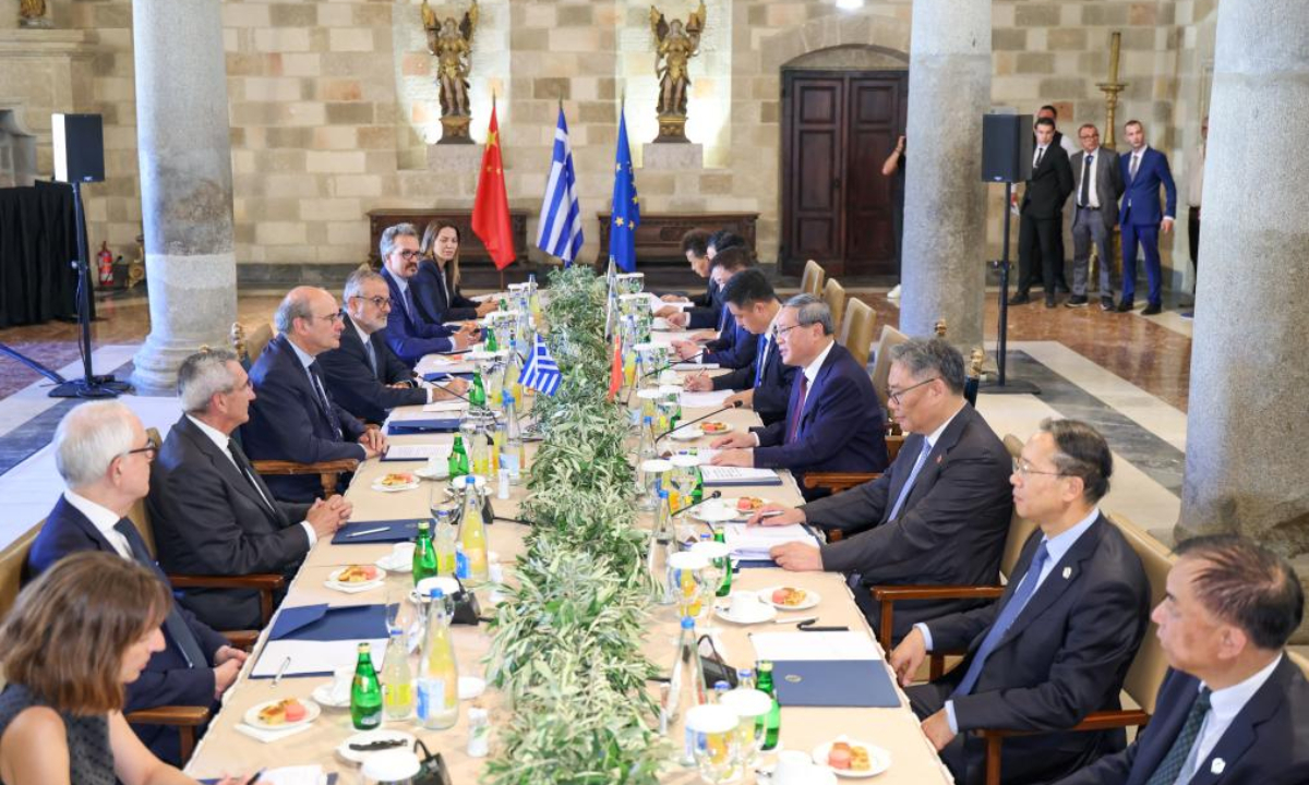 Chinese Premier Li Qiang meets with Greek Deputy Prime Minister Kostis Hatzidakis on the island of Rhodes, Greece, July 4, 2025. (Xinhua/Liu Bin)