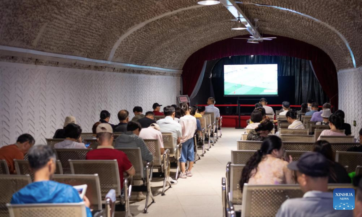 Residents cool off at an air-raid shelter in Hangzhou, east China's Zhejiang Province, July 3, 2025. Starting from July 1, the city's cooling centers transformed from air-raid shelters were open to the public free of charge for two months. Hangzhou issued an orange heat alert on Thursday. (Xinhua/Jiang Han)