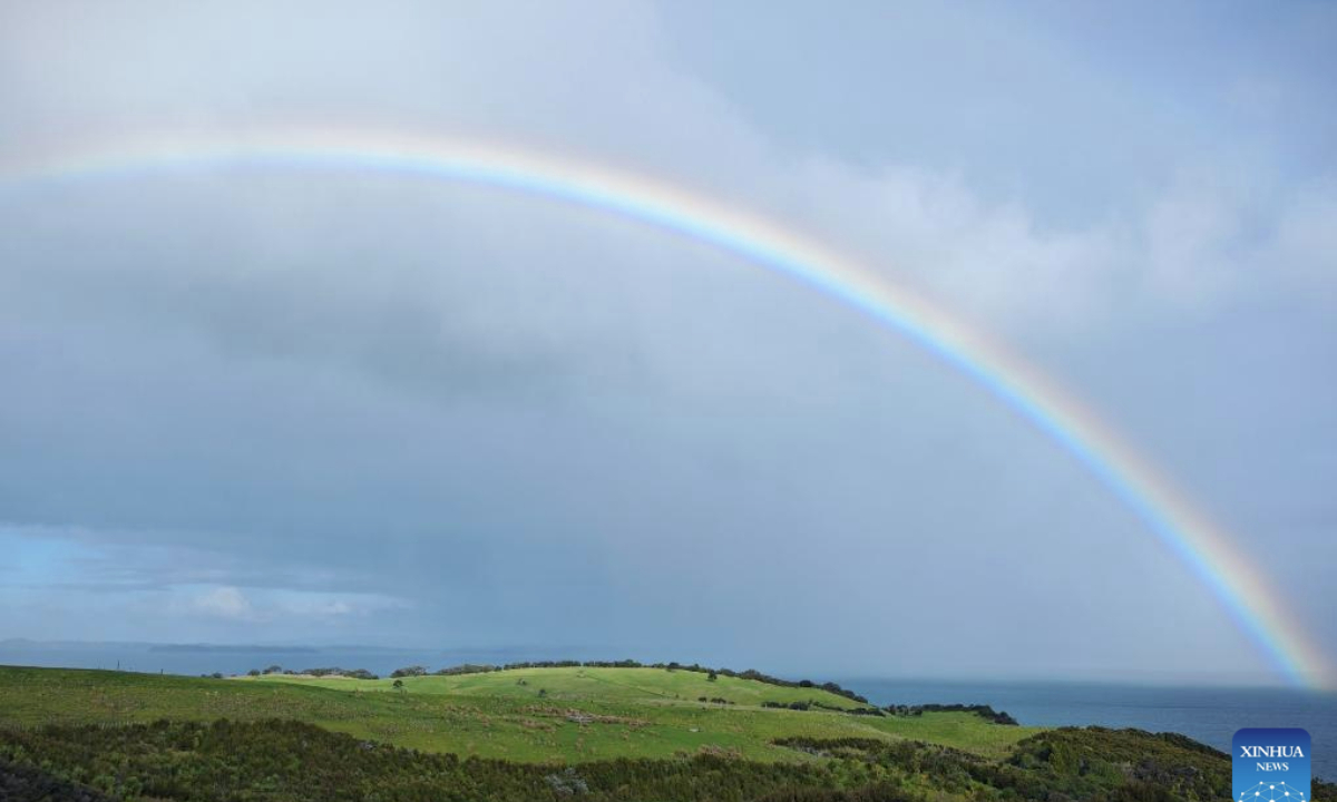 This photo taken on June 29, 2025 shows a rainbow in the sky in North Island, New Zealand. (Photo by Wu Jiaxiang/Xinhua)