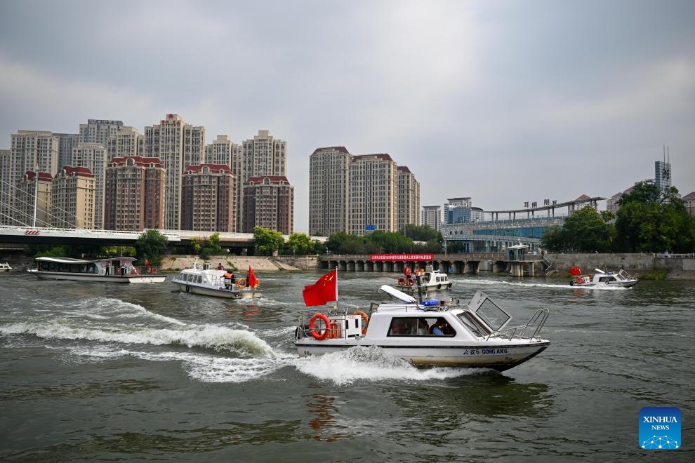 Rescuers participate in a flood rescue drill on Haihe River in north China's Tianjin, on July 5, 2025. The drill was set against potential flooding in culverts and low-lying urban areas affected by heavy rainfall. (Photo: Xinhua)