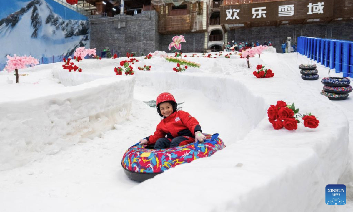 A child plays at an indoor ski resort in Changsha, central China's Hunan Province, July 17, 2025. Built 36 meters underground, the indoor ski resort provides an escape for its visitors during summer. (Xinhua/Chen Sihan)