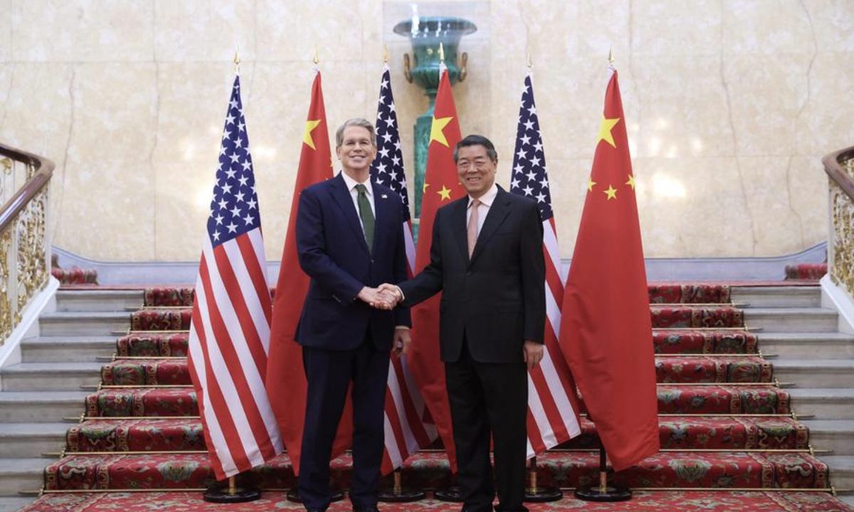 Chinese Vice Premier He Lifeng, also a member of the Political Bureau of the Communist Party of China Central Committee, shakes hands with U.S. Treasury Secretary Scott Bessent prior to the first meeting of the China-U.S. economic and trade consultation mechanism in London, Britain, June 9, 2025. (Xinhua/Li Ying)