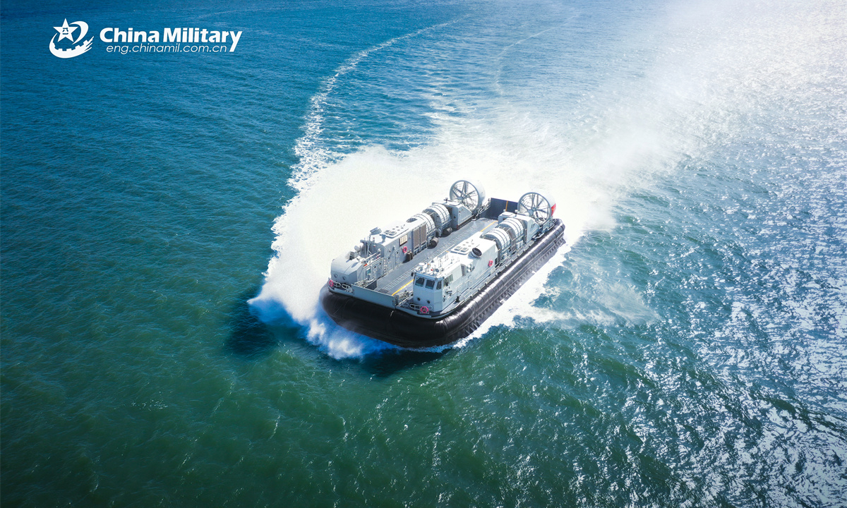 A landing craft air cushion (LCAC) attached to a landing ship group with the navy under the Chinese PLA Southern Theater Command steams to the beach-head at lightning speed during a maritime training exercise. (eng.chinamil.com.cn/Photo by Zhang Xueyan)