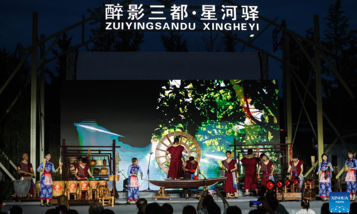 Actors perform during the village summer musical season in Sandu Township, Jiande City, east China's Zhejiang Province, July 11, 2025. (Xinhua/Xu Yu)