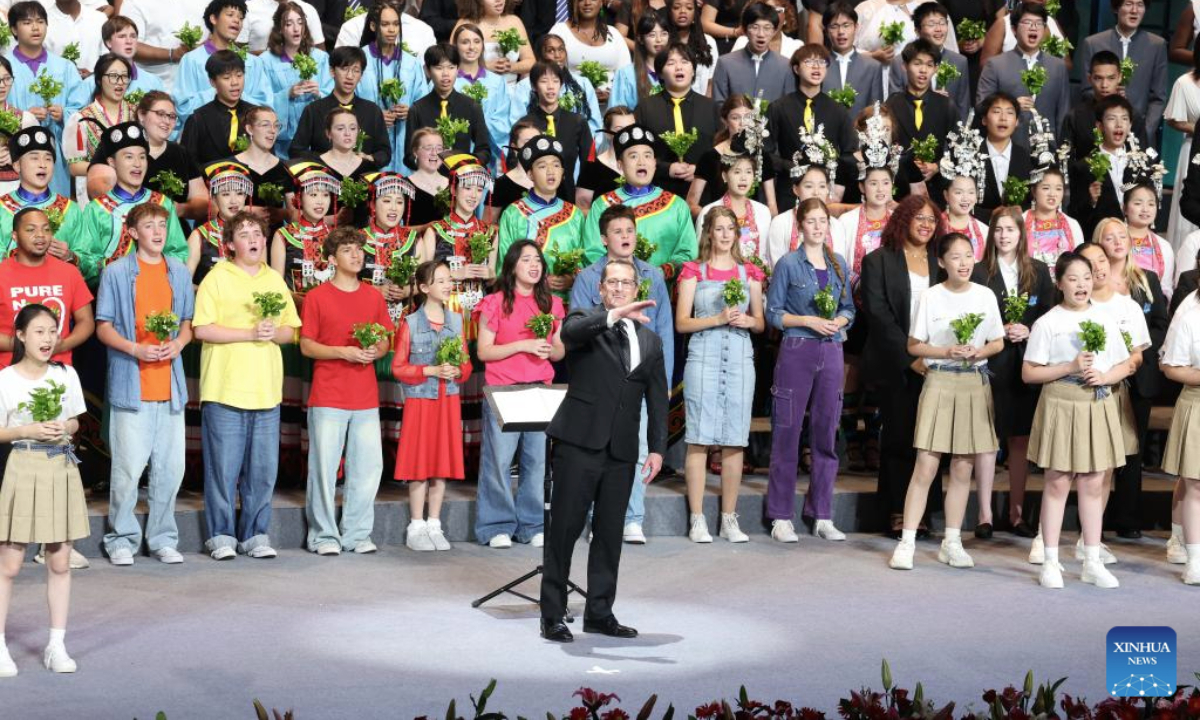 Teenagers from China and the United States sing during a performance at China National Opera House in Beijing, capital of China, July 16, 2025. A closing performance of Bond with Kuliang: 2025 China-U.S. Youth Choir Festival, with the theme of Singing for Peace, was staged in Beijing on Wednesday. (Xinhua/Lu Ye)
