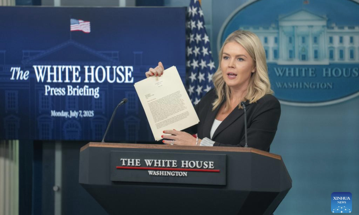 White House Press Secretary Karoline Leavitt showcases U.S. President Donald Trump's letter to the Japanese prime minister during a press briefing at the White House in Washington, D.C., the United States, on July 7, 2025. Leavitt said Monday afternoon that U.S. President Donald Trump plans to issue an executive order to extend the pause on reciprocal tariffs from July 9 to Aug. 1. (Xinhua/Hu Yousong)