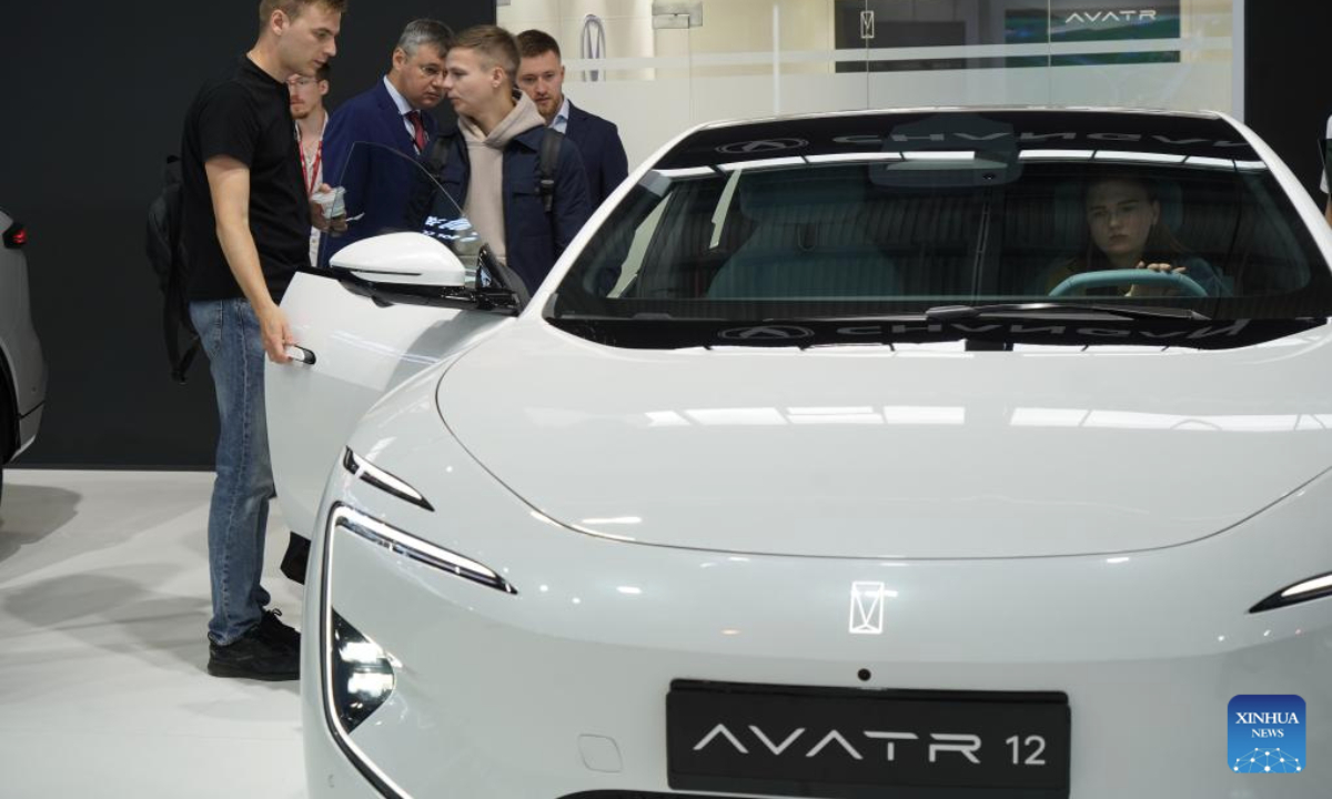 People visit the ninth China-Russia Expo in Yekaterinburg, Russia, July 7, 2025. Chinese enterprises showcase products in sectors such as electromechanical equipment, agriculture, health care, the digital economy and new energy at the event. (Xinhua/Liu Kai)
