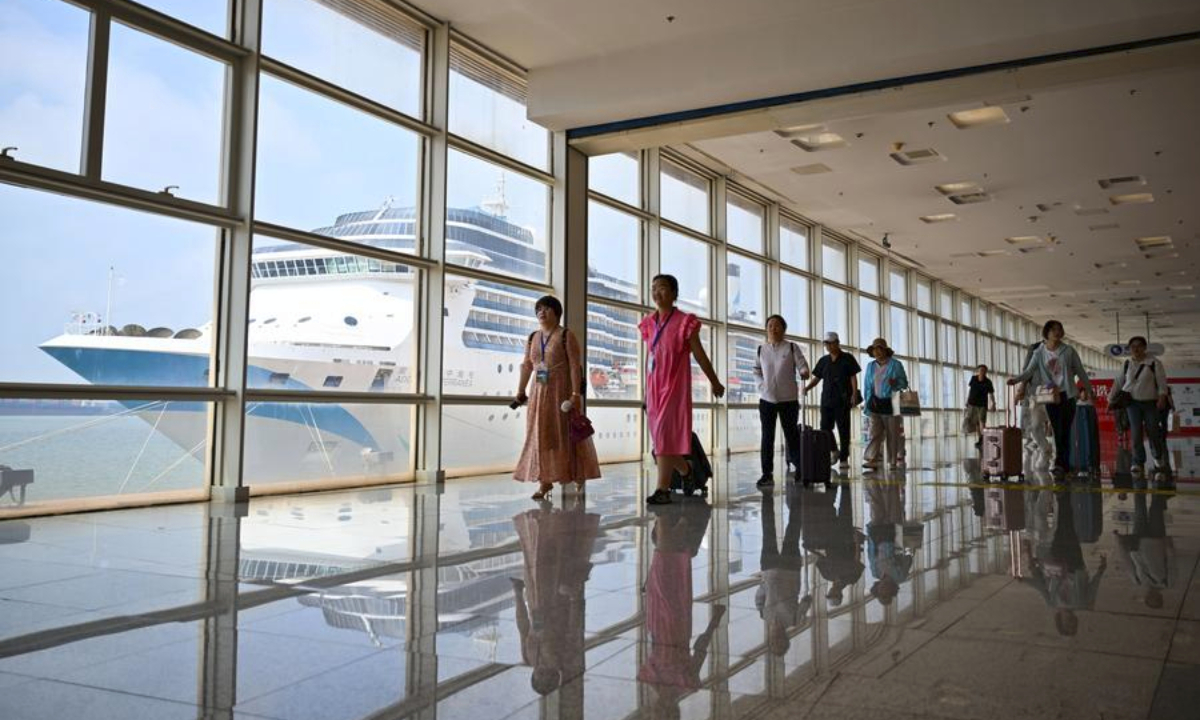 Travellers arrive at Tianjin International Cruise Home Port in Tianjin, north China, July 23, 2025. (Xinhua/Sun Fanyue)