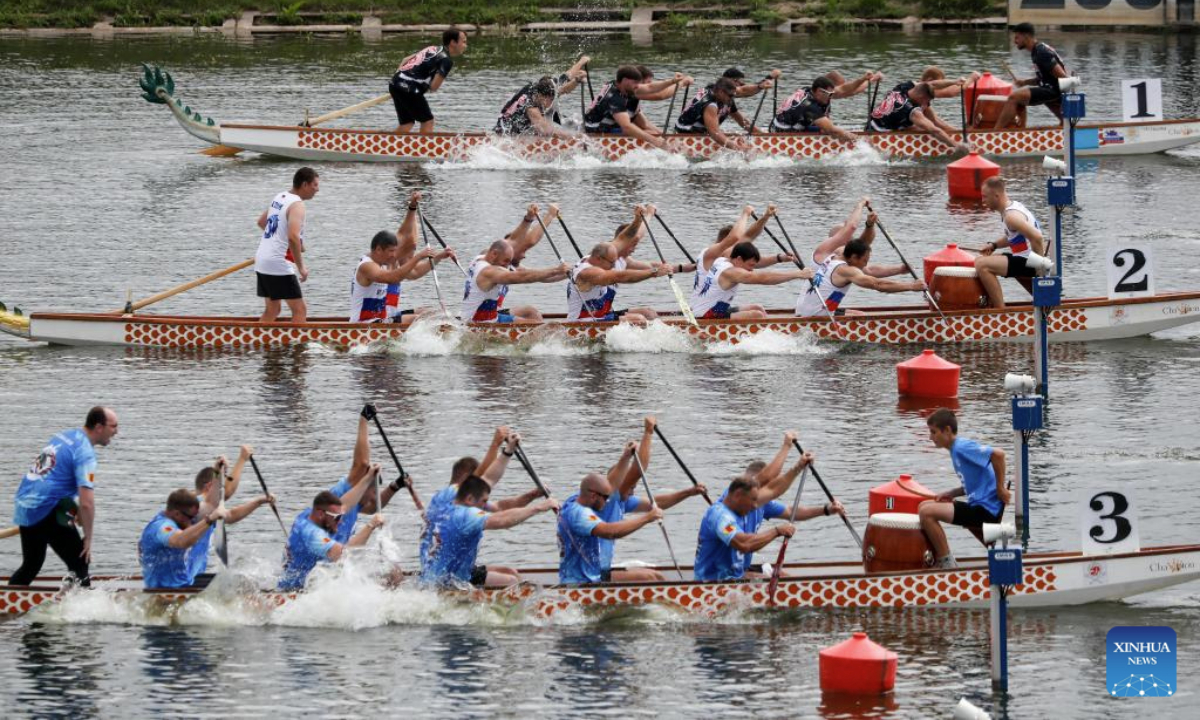 Teams compete during the dragon boat championship of Russia in Moscow, Russia, July 23, 2025. (Photo by Alexander Zemlianichenko Jr/Xinhua)