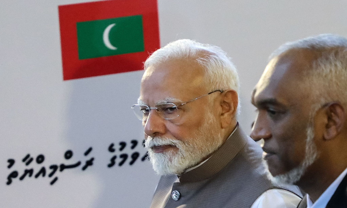 India's Prime Minister Narendra Modi (L) arrives to present 'Bharat Health Initiative for Sahyog, Hita and Maitri' (BHISHM) portable medical cubes to the President of Maldives Mohamed Muizzu (R) during his state visit in Male on July 25, 2025. Photo:VCG
