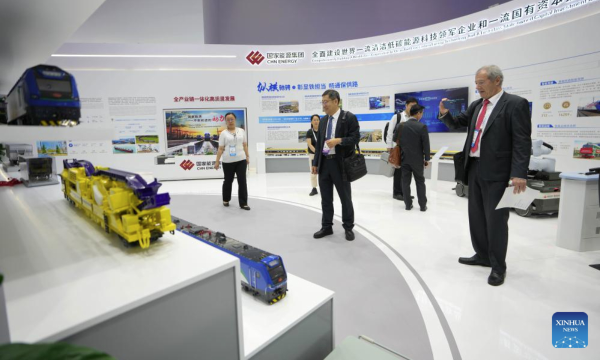 People visit the Modern Railways 2025 exhibition in Beijing, capital of China, July 8, 2025. The exhibition kicked off here on Tuesday, showcasing advanced railway technologies and equipments from all over the world. (Xinhua/Xing Guangli)