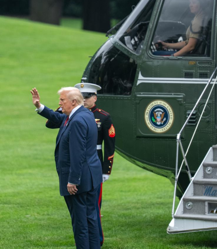 U.S. President Donald Trump waves before boarding Marine One at the White House in Washington, D.C., the United States, on Aug. 1, 2025. U.S. President Donald Trump on Friday announced that he has ordered the firing of Erika McEntarfer, commissioner of the Bureau of Labor Statistics (BLS), accusing her of manipulating data for political purposes. (Xinhua/Hu Yousong)