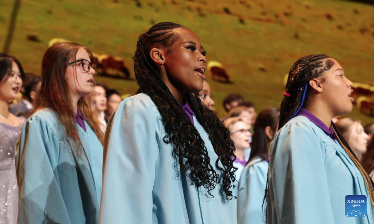 Teenagers from the United States sing during a performance at China National Opera House in Beijing, capital of China, July 16, 2025. A closing performance of Bond with Kuliang: 2025 China-U.S. Youth Choir Festival, with the theme of Singing for Peace, was staged in Beijing on Wednesday. (Xinhua/Lu Ye)