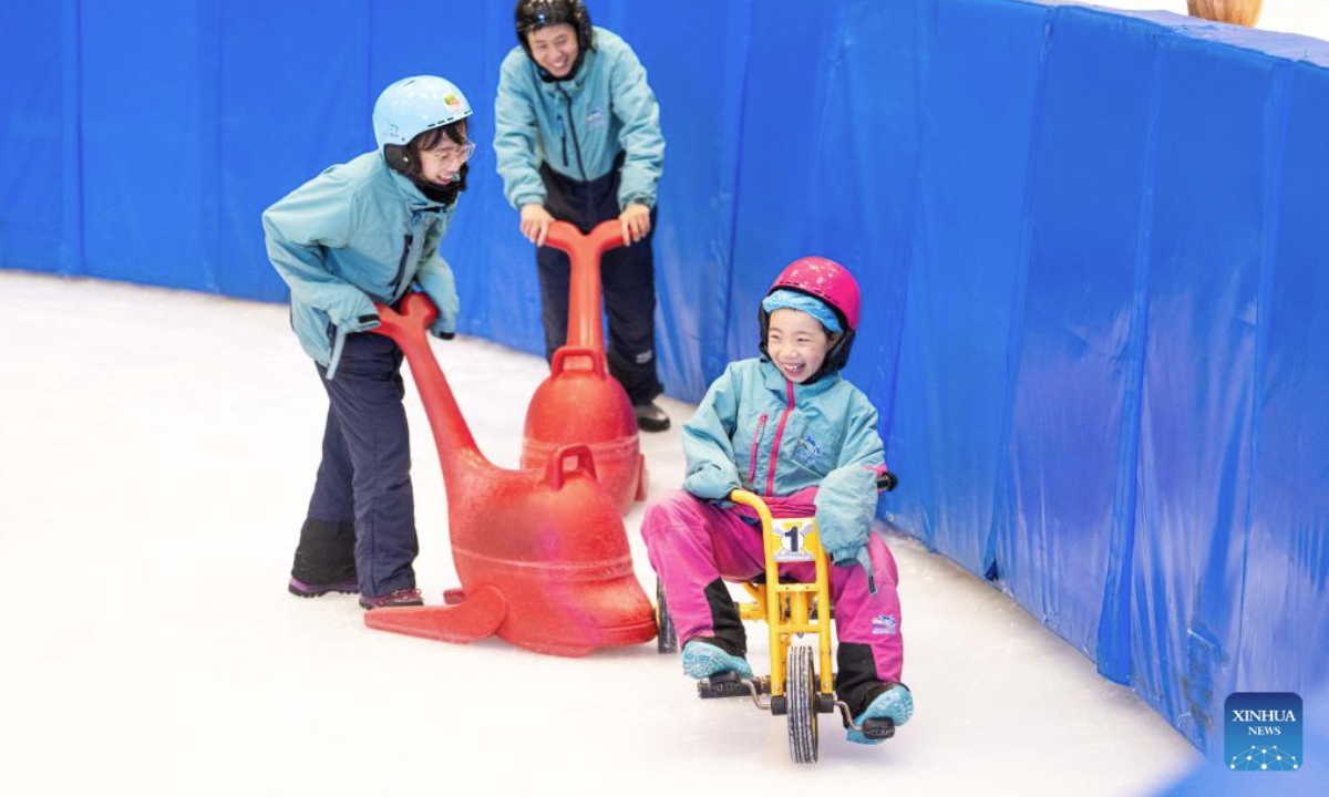 People play at an indoor ski resort in Changsha, central China's Hunan Province, July 17, 2025. Built 36 meters underground, the indoor ski resort provides an escape for its visitors during summer. (Xinhua/Chen Sihan)