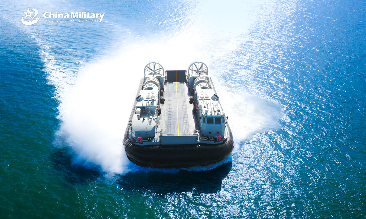 A landing craft air cushion (LCAC) attached to a landing ship group with the navy under the Chinese PLA Southern Theater Command steams to the beach-head at lightning speed during a maritime training exercise. (eng.chinamil.com.cn/Photo by Zhang Xueyan)