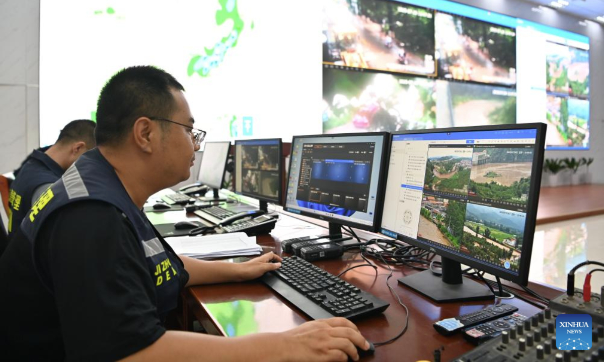 Staff members are on duty at an emergency headquarters in Jizhou District of north China's Tianjin, July 28, 2025. Houses, bridges and power lines at part of villages in Jizhou District were damaged by floods inflicted by recent heavy rainfall and upstream runoff.

Local emergency operations including search and rescue, evacuee transfer, and disaster relief are orderly going on. (Xinhua/Li Ran)
