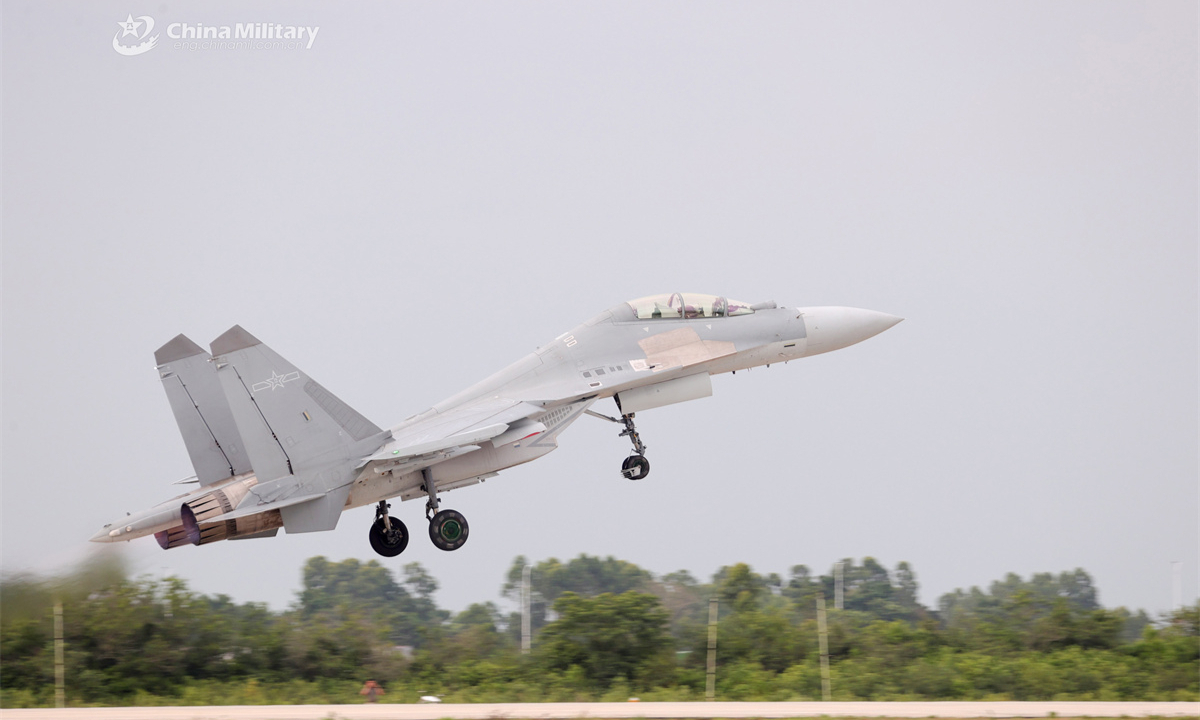 A J-16 multi-role fighter jet attached to an aviation brigade under the Chinese PLA Air Force speeds up to take off during a recent flight training exercise. (eng.chinamil.com.cn/Photo by Zhang Weishan)