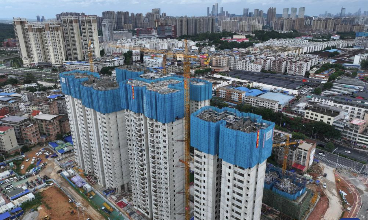 An aerial drone photo taken on July 21, 2025 shows a urban village renovation project in Nanning City, south China's Guangxi Zhuang Autonomous Region. Since this year on, Guangxi's provincial department of finance has raised a total of about 3.4 billion yuan financial subsidy (about 473.9 million U.S. dollars) to support the construction of affordable housing projects in urban areas, which has improved the public demand for high-quality housing. (Xinhua/Huang Xiaobang)
