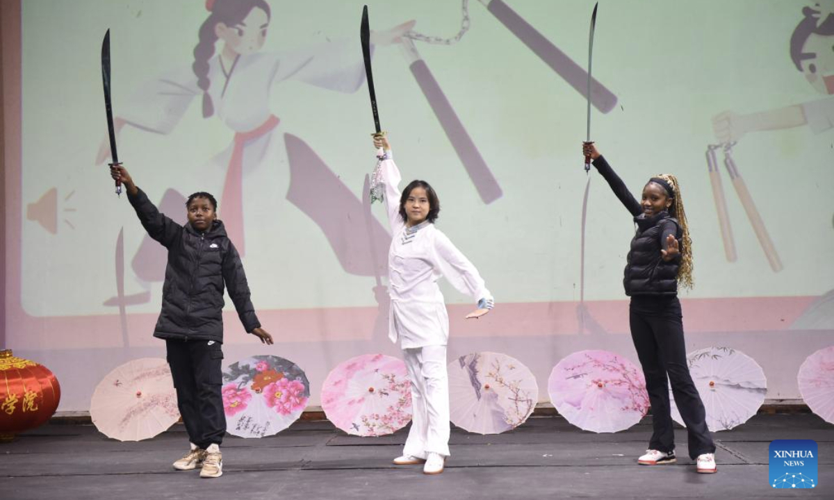 A Chinese instructor and Botswanan students perform martial arts during a Chinese culture show in Gaborone, Botswana, on July 29, 2025. A Chinese culture show was performed on Tuesday at a secondary school with an international enrolment in Gaborone, the capital of Botswana, to offer an immersive journey and highlight the beauty of cultural exchanges. (Photo by Tshekiso Tebalo/Xinhua)