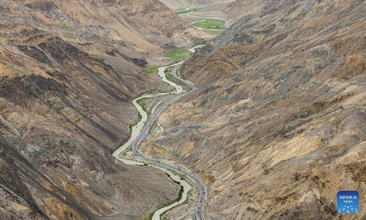 An aerial drone photo taken on July 24, 2025 shows a section of the Karakoram Highway in Taxkorgan Tajik Autonomous County, northwest China's Xinjiang Uygur Autonomous Region. Karakoram Highway, also called the China-Pakistan Friendship Highway, is one of the highest paved roads in the world. (Xinhua/Zhang Keren)