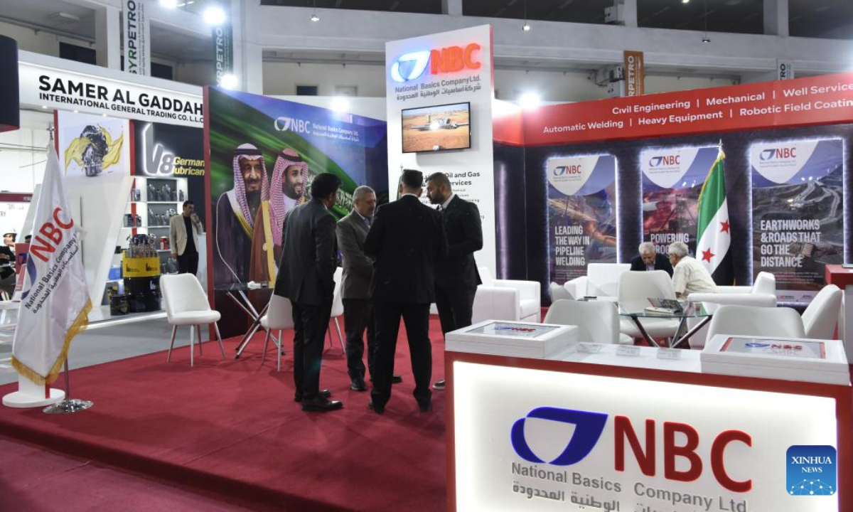 Representatives gather at the Saudi National Basics Company Ltd. (NBC) booth during the 6th Syria International Exhibition for Petroleum, Energy, and Mineral Resources in Damascus, Syria, July 7, 2025. (Photo by Monsef Memari/Xinhua)