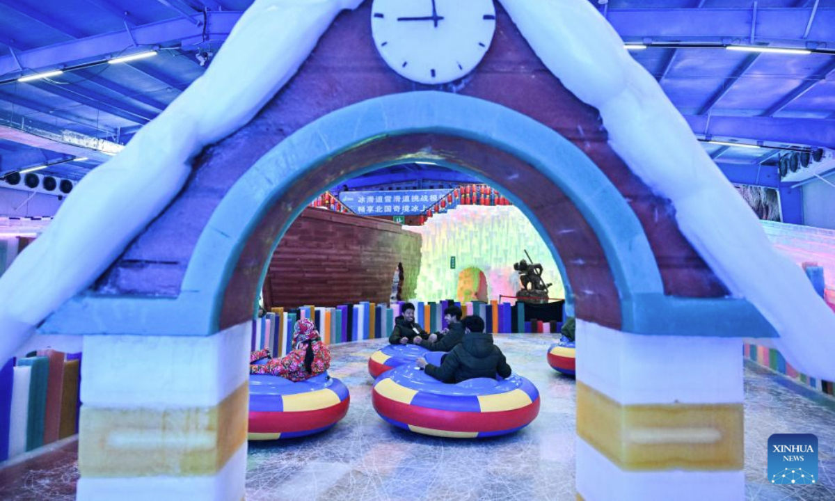 People have fun at an indoor snow and ice world in Huaian, east China's Jiangsu Province, July 15, 2025. An indoor snow and ice world, established at Jinhu water forest scenic spot in Huaian, provides tourists with a refreshing experience in summer. (Xinhua/Ji Chunpeng)